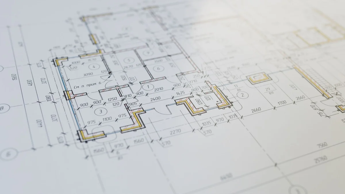 Hoge resolutie close-up van een architectonische plattegrond die ontwerpdiensten toont.